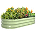Fruit green 5x2x1 ft oval galvanized steel raised garden bed planted with greenery and flowers, metal planter for outdoor garden use
