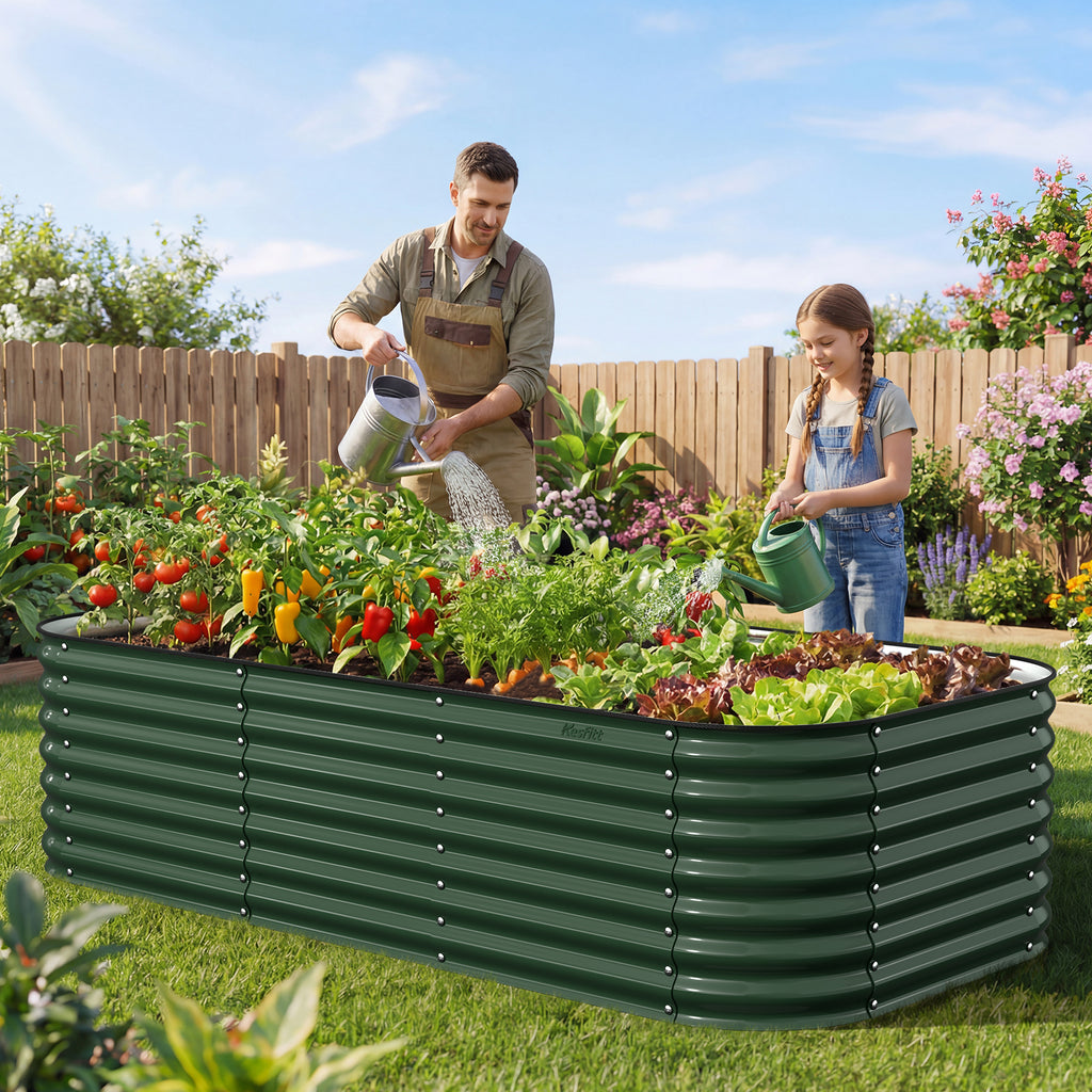family gardening together using large raised garden bed in backyard vegetable garden
